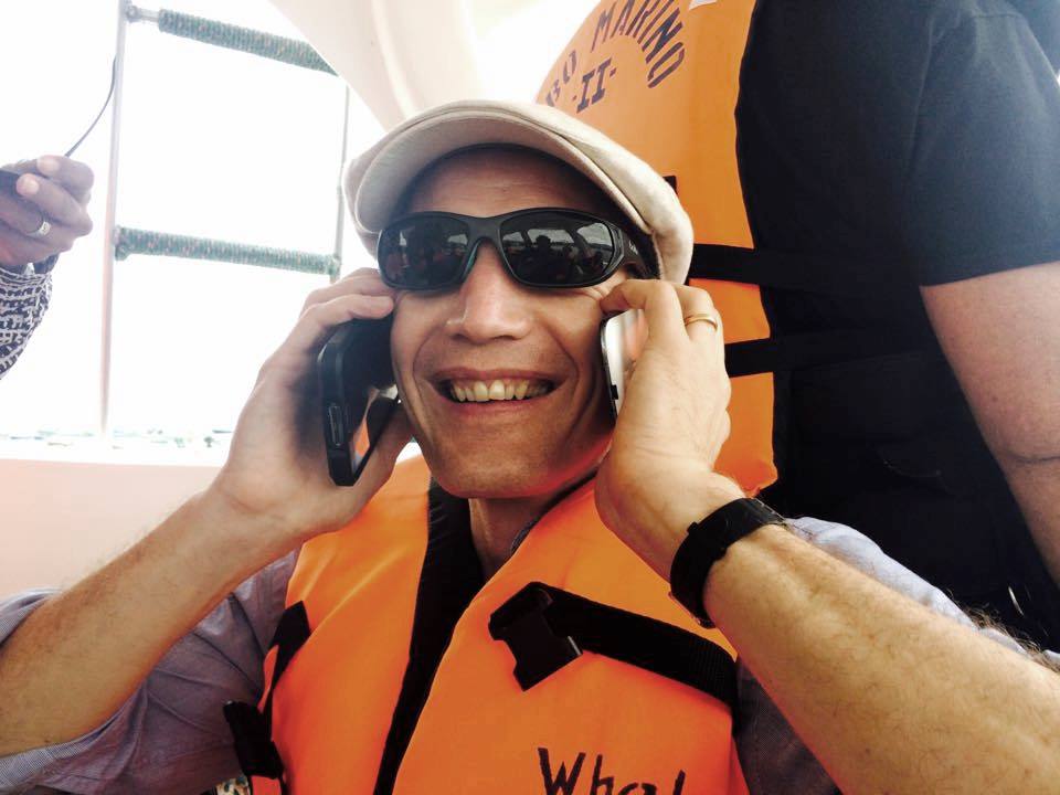 Dom on the phone(s) on a recent TV production, chasing whales off the coast 